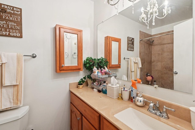 12755 S Kenneth Ave Unit E, Alsip, IL 60803 - bathroom featuring toilet, a shower, a chandelier, and vanity