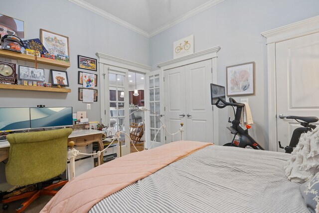663 W Wellington Ave Unit 1, Chicago, IL 60657 - bedroom with crown molding, an office area, french doors, and a closet
