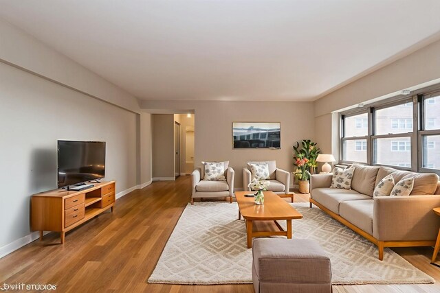 4960 N Marine Dr Unit 720, Chicago, IL 60640 - unfurnished room featuring light wood-style flooring and baseboard heating