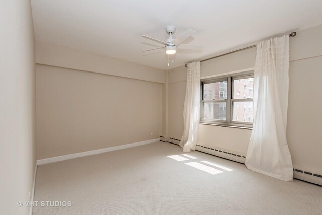 4960 N Marine Dr Unit 720, Chicago, IL 60640 - carpeted spare room featuring a ceiling fan and a baseboard heating unit