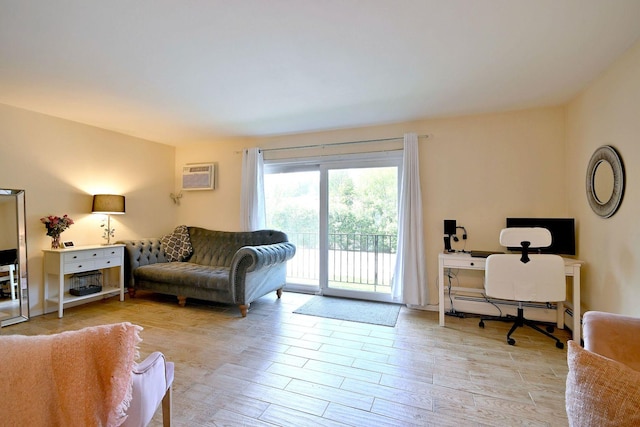 505 N Kenilworth Ave Unit 3, Glen Ellyn, IL 60137 - living area featuring a wall mounted AC, light wood-type flooring, baseboard heating, and a desk