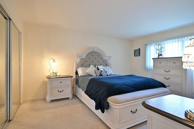 505 N Kenilworth Ave Unit 3, Glen Ellyn, IL 60137 - bedroom featuring light colored carpet, baseboards, and a closet