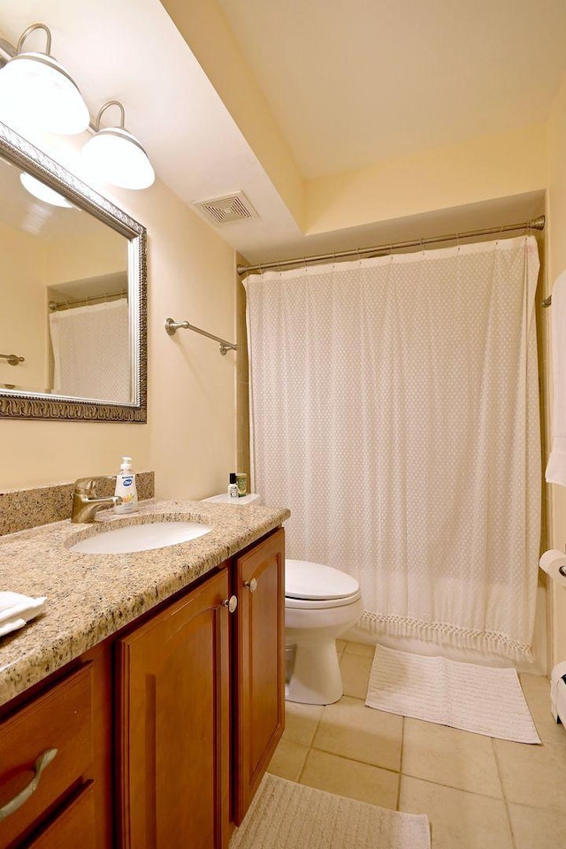 505 N Kenilworth Ave Unit 3, Glen Ellyn, IL 60137 - full bath featuring toilet, vanity, and tile patterned flooring