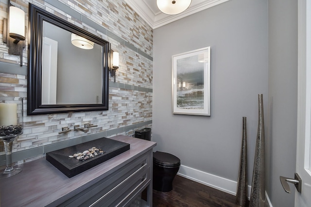 1308 N Wright St, Naperville, IL 60563 - half bathroom with vanity, wood finished floors, and ornamental molding