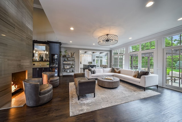 1308 N Wright St, Naperville, IL 60563 - living room with crown molding, dark wood-style floors, a bar, and recessed lighting