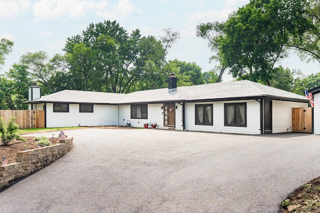 3N544 Bittersweet Rd, Saint Charles, IL 60175 - ranch-style house with a chimney and driveway