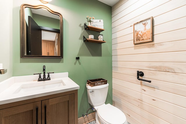 3N544 Bittersweet Rd, Saint Charles, IL 60175 - bathroom with vanity, toilet, and wood walls