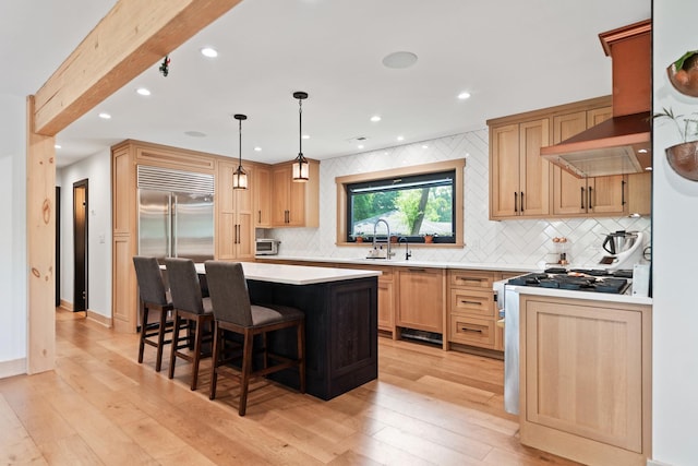 3N544 Bittersweet Rd, Saint Charles, IL 60175 - kitchen with a kitchen breakfast bar, a kitchen island, decorative backsplash, light countertops, and recessed lighting