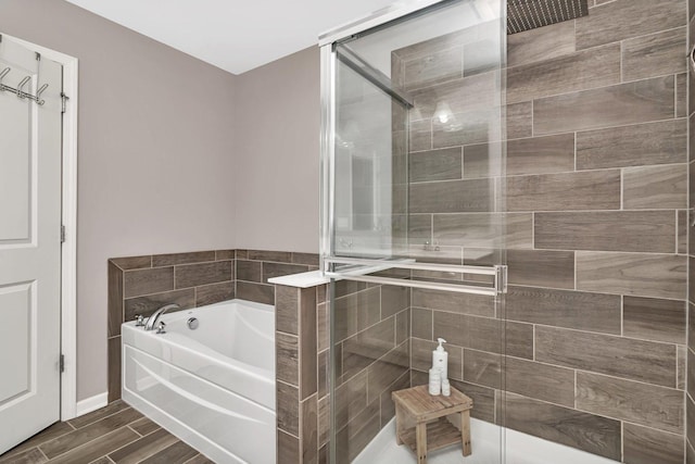 16127 W Switch Grass Rd, Lockport, IL 60441 - full bathroom with a stall shower, a garden tub, and wood finished floors