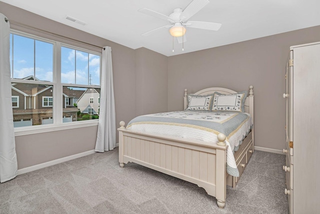 16127 W Switch Grass Rd, Lockport, IL 60441 - carpeted bedroom with baseboards and a ceiling fan