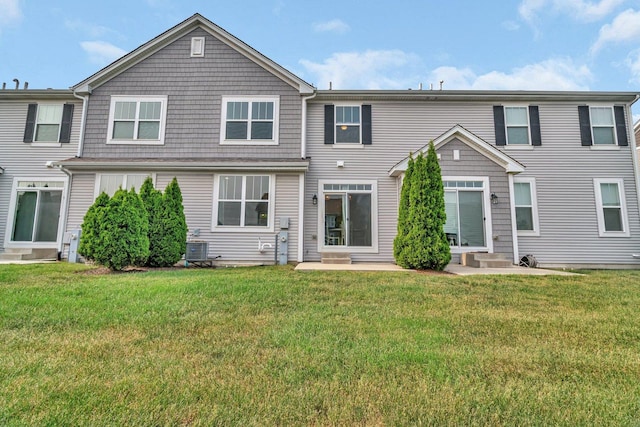 16127 W Switch Grass Rd, Lockport, IL 60441 - rear view of property with a lawn, central AC, and entry steps