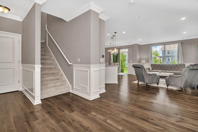 16127 W Switch Grass Rd, Lockport, IL 60441 - living area with ornamental molding, dark wood-type flooring, stairs, recessed lighting, and a wainscoted wall