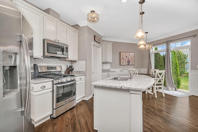16127 W Switch Grass Rd, Lockport, IL 60441 - kitchen with stainless steel appliances, a sink, crown molding, a chandelier, and a center island with sink