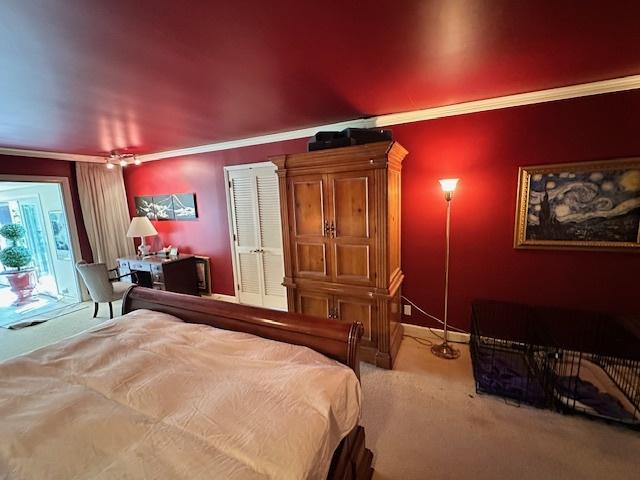 22 Greencroft Dr, Champaign, IL 61821 - carpeted bedroom with ornamental molding