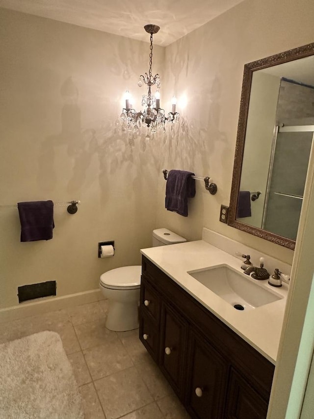 22 Greencroft Dr, Champaign, IL 61821 - bathroom featuring vanity, toilet, a shower with shower door, tile patterned floors, and a chandelier
