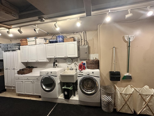 22 Greencroft Dr, Champaign, IL 61821 - washroom featuring washer and dryer, cabinet space, and rail lighting