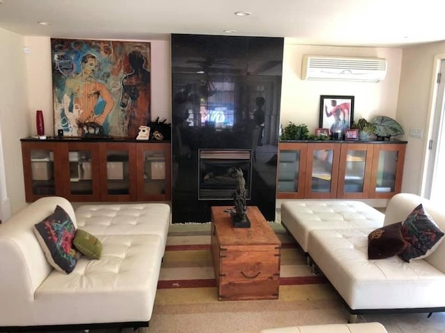 22 Greencroft Dr, Champaign, IL 61821 - living room featuring an AC wall unit, a fireplace, and recessed lighting