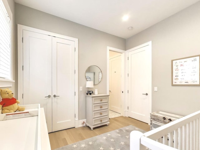 2745 N Greenview Ave Unit 2, Chicago, IL 60614 - bedroom featuring light wood-type flooring and a closet
