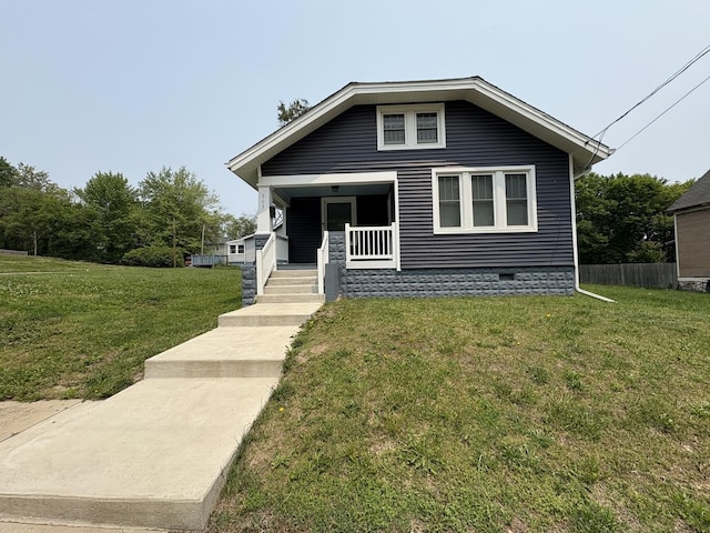 903 E Behrends Ave, Peoria, IL 61603 - view of front of home featuring covered porch and a front yard