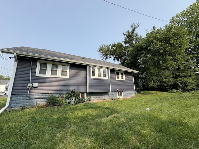 903 E Behrends Ave, Peoria, IL 61603 - back of house featuring a lawn