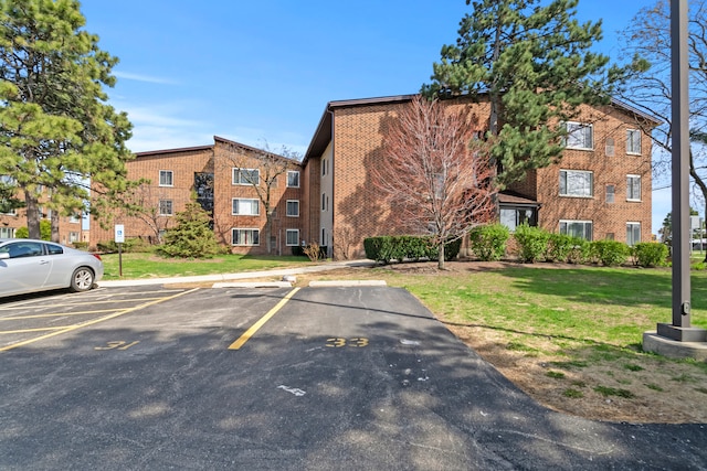 990 Perrie Dr Unit 201, Elk Grove Village, IL 60007 - view of apartment building / complex with uncovered parking