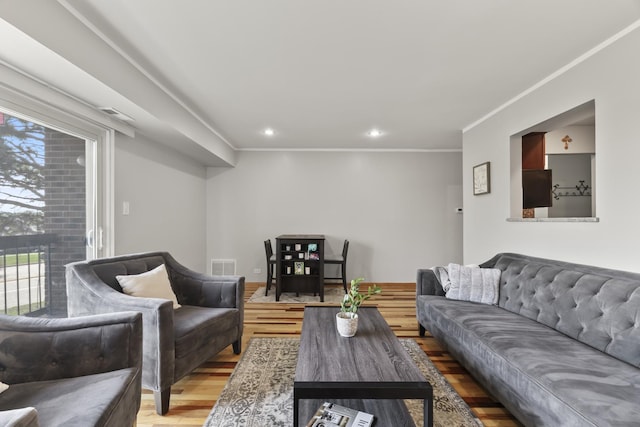 990 Perrie Dr Unit 201, Elk Grove Village, IL 60007 - living area with wood finished floors, healthy amount of natural light, crown molding, and recessed lighting