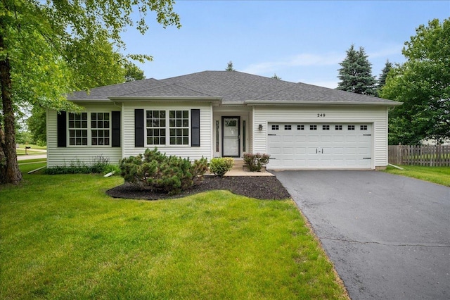 249 Spring Ct, North Aurora, IL 60542 - single story home featuring asphalt driveway and a garage