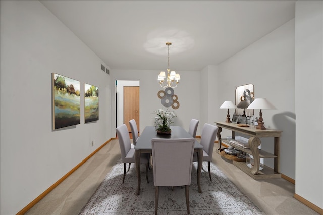 249 Spring Ct, North Aurora, IL 60542 - dining area with carpet floors and a chandelier
