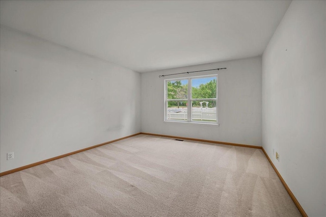 249 Spring Ct, North Aurora, IL 60542 - unfurnished room featuring carpet and baseboards