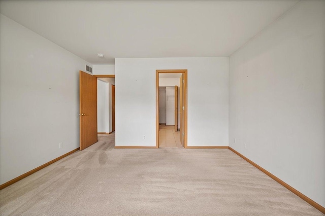 249 Spring Ct, North Aurora, IL 60542 - empty room featuring light carpet and baseboards