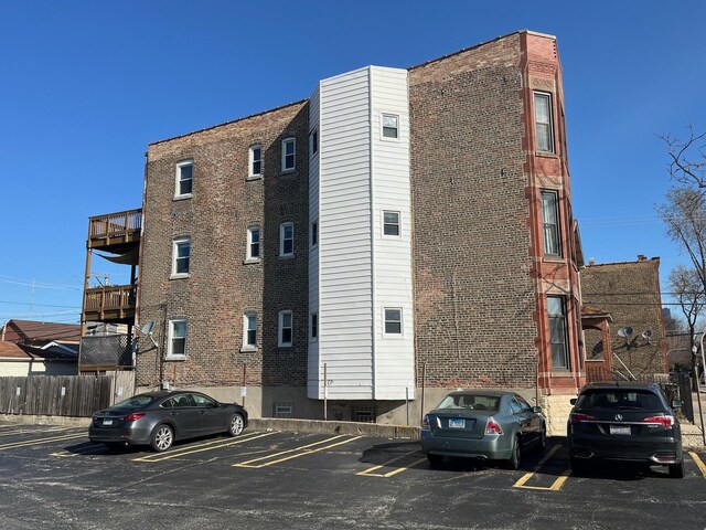3116 S Canal St, Chicago, IL 60616 - view of building exterior featuring uncovered parking