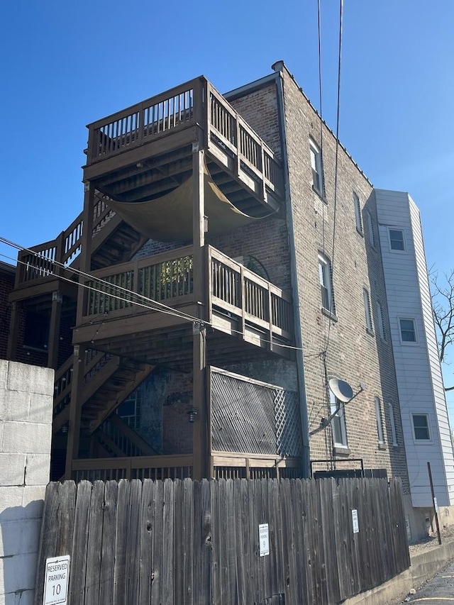 3116 S Canal St, Chicago, IL 60616 - view of home's exterior with brick siding and a deck