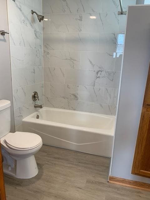 3116 S Canal St, Chicago, IL 60616 - full bathroom with toilet, wood finished floors, and bathtub / shower combination
