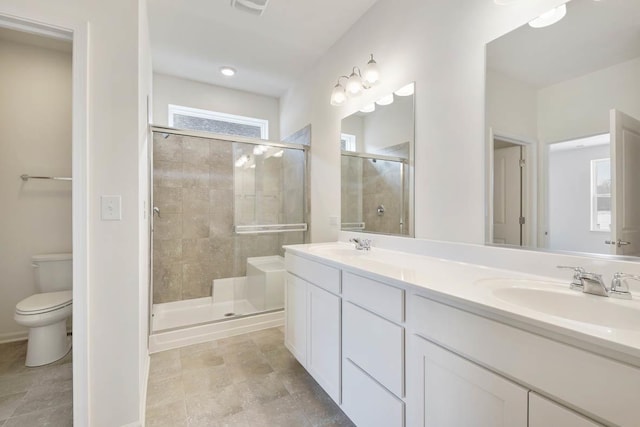 14657 S Greenbriar Dr, Plainfield, IL 60544 - full bathroom with a shower stall, double vanity, and toilet