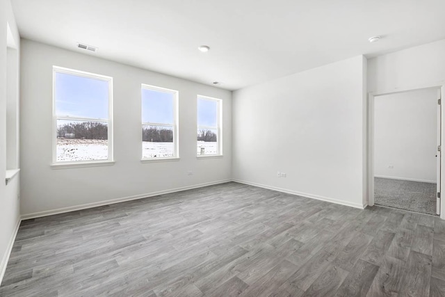 14657 S Greenbriar Dr, Plainfield, IL 60544 - unfurnished bedroom featuring wood finished floors and baseboards