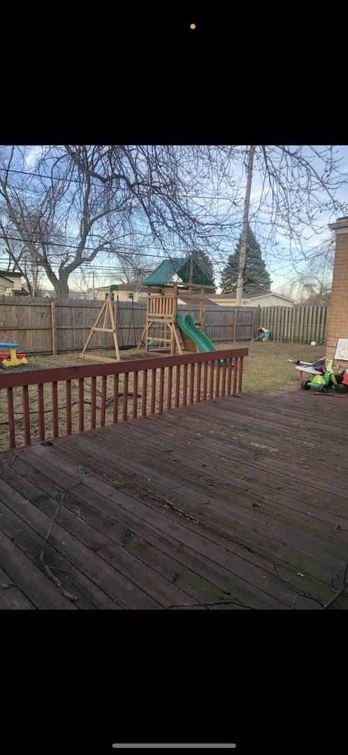 480 E 163rd St, South Holland, IL 60473 - wooden terrace featuring a playground and a fenced backyard