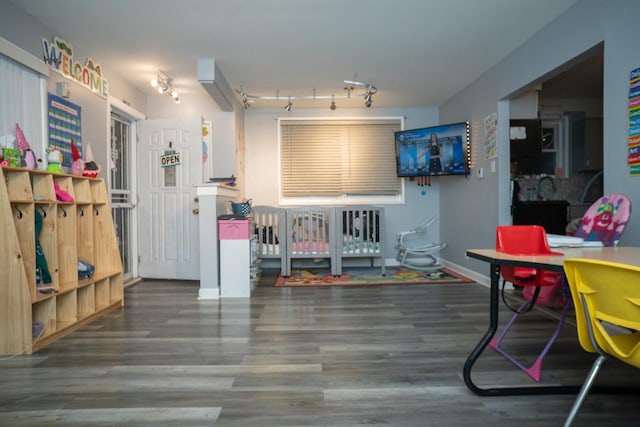 480 E 163rd St, South Holland, IL 60473 - dining space with wood finished floors, baseboards, and rail lighting