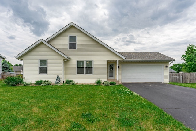 5724 Pierce Ln, South Beloit, IL 61080 - traditional-style house featuring asphalt driveway and a garage