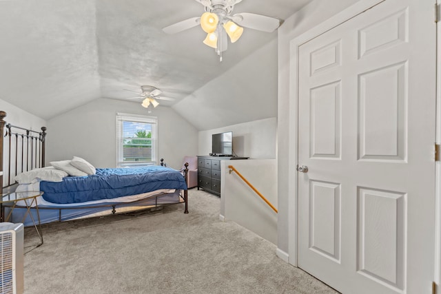 5724 Pierce Ln, South Beloit, IL 61080 - carpeted bedroom with vaulted ceiling, a ceiling fan, and baseboards