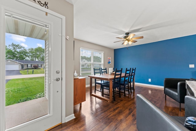 5724 Pierce Ln, South Beloit, IL 61080 - dining space with a ceiling fan, dark wood-style floors, and baseboards