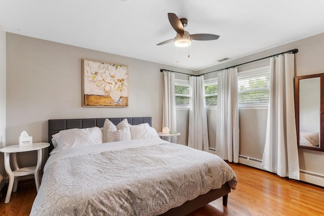 11111 Doogan Ave, Willow Springs, IL 60480 - bedroom with light wood-style flooring and ceiling fan