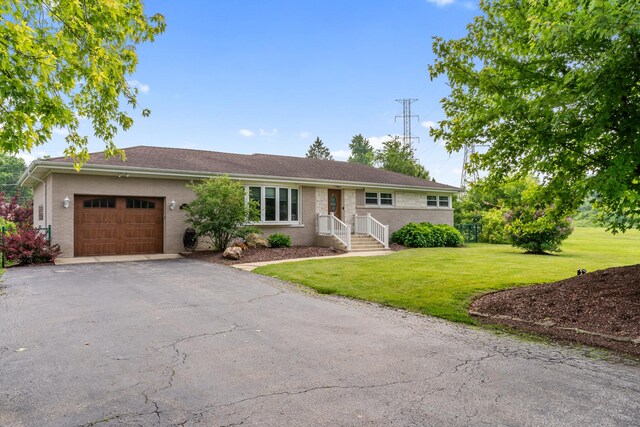 11111 Doogan Ave, Willow Springs, IL 60480 - ranch-style home with an attached garage, driveway, brick siding, and a front yard