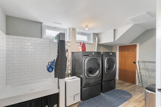 11111 Doogan Ave, Willow Springs, IL 60480 - laundry area featuring washer and clothes dryer and light wood-style floors