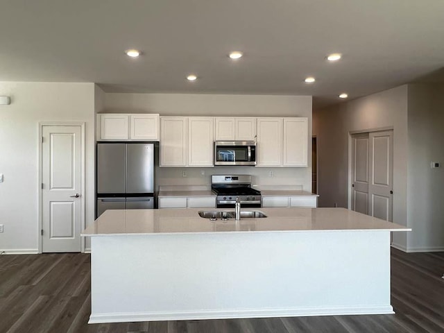 1097 Savannah Ln, Pingree Grove, IL 60140 - kitchen featuring stainless steel appliances, white cabinetry, dark wood-type flooring, baseboards, and light countertops