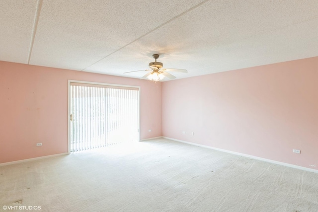 6807 N Milwaukee Ave Unit 303, Niles, IL 60714 - unfurnished room with ceiling fan and light carpet