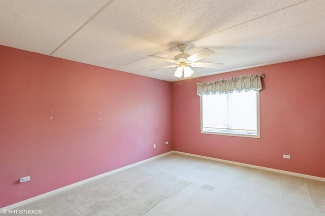 6807 N Milwaukee Ave Unit 303, Niles, IL 60714 - spare room featuring ceiling fan and light carpet