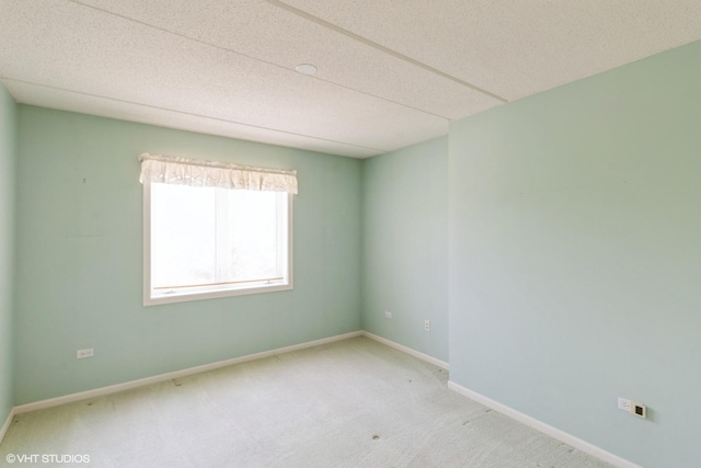 6807 N Milwaukee Ave Unit 303, Niles, IL 60714 - unfurnished room featuring carpet floors and baseboards