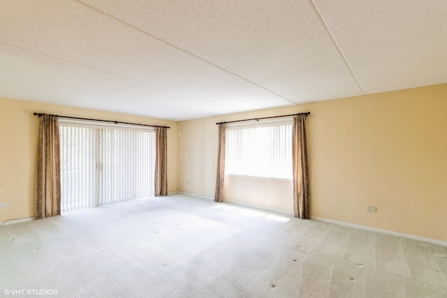 6807 N Milwaukee Ave Unit 303, Niles, IL 60714 - spare room with carpet floors and baseboards