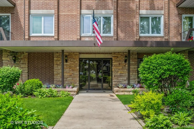 9500 N Washington St Unit 510, Niles, IL 60714 - view of exterior entry featuring stone siding and brick siding