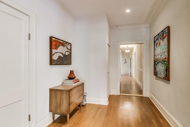 425 Greenwood St Unit 1E, Evanston, IL 60201 - hallway featuring light wood-type flooring, crown molding, baseboards, and recessed lighting